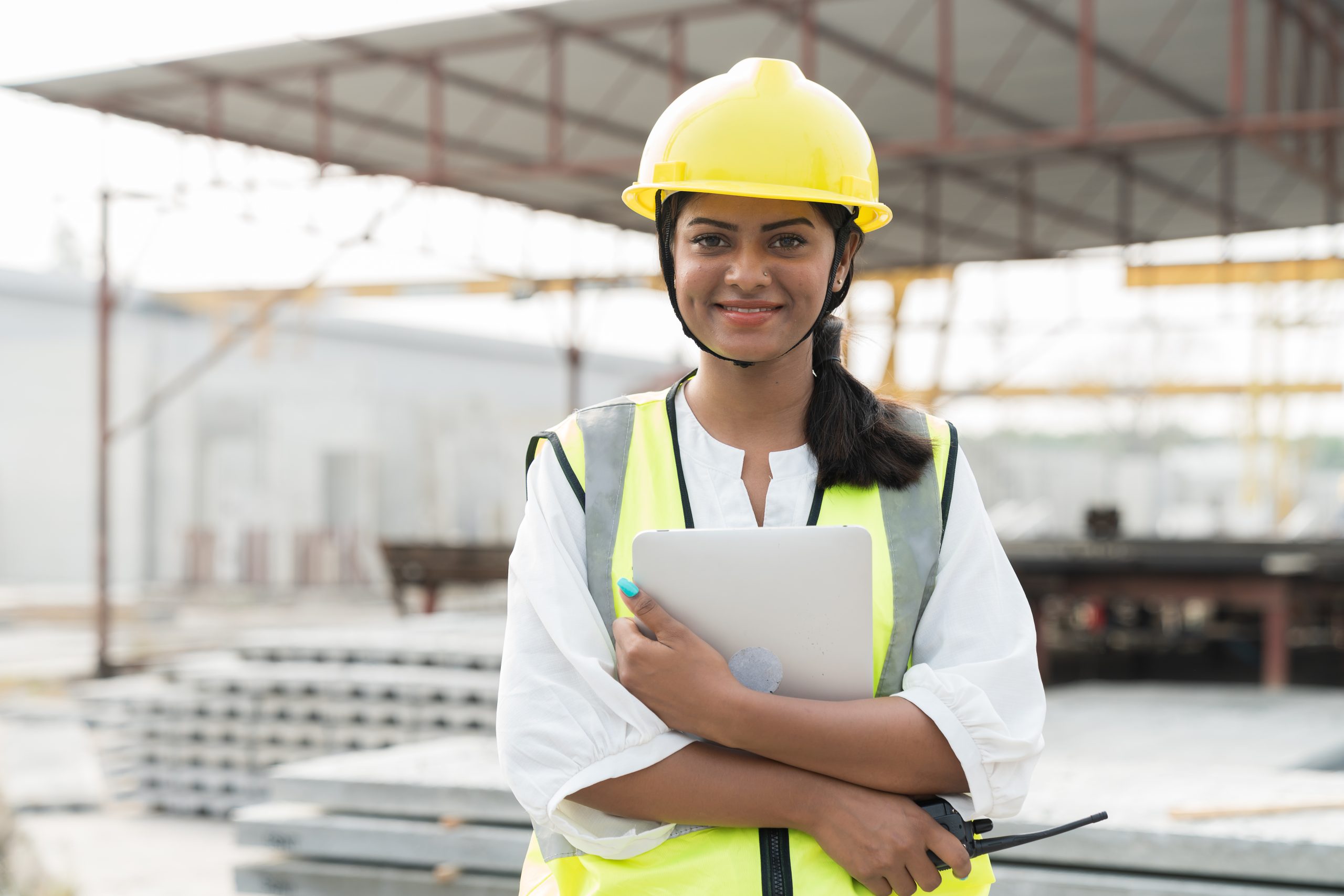 Foreman builder woman at construction site. Asian foreman constr